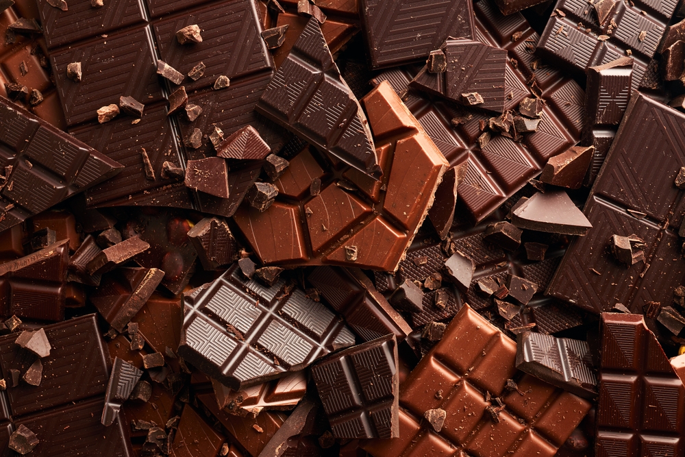 Broken chocolate bar texture background