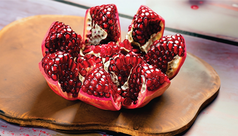 The image you sent me shows a group of pomegranates sitting on top of a table