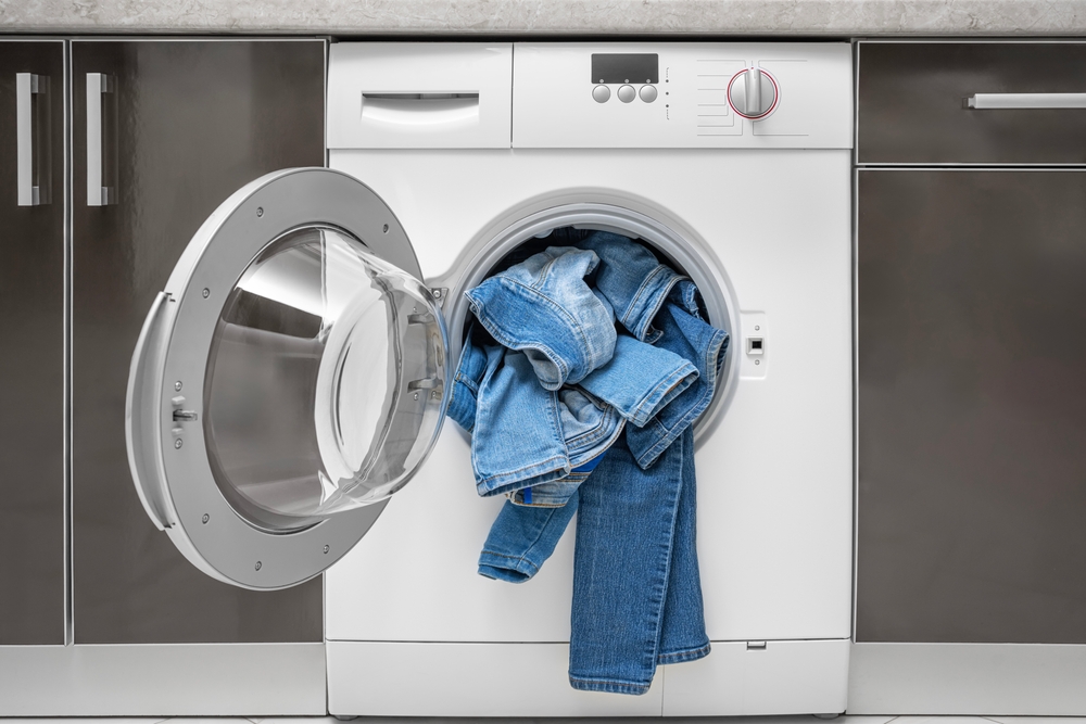 Washing denim items in the washing machine. Delicate cleaning.
