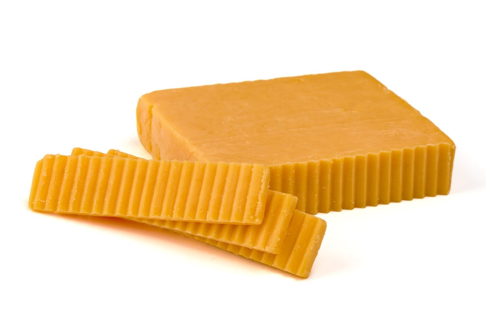 Cheddar cheese, isolated on white background. High resolution image
