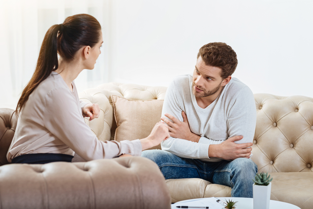 Nice pleasant couple talking to each other
