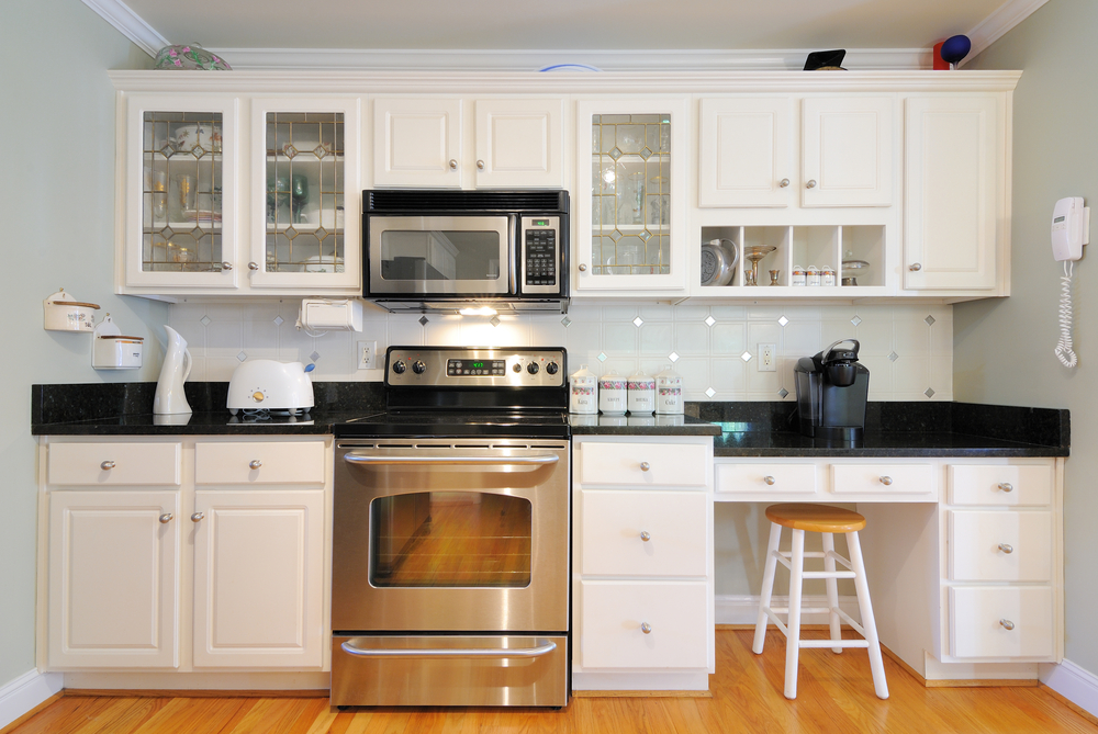 Kitchen cabinets n a modern home living room.