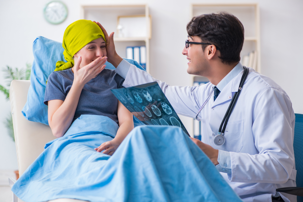 Cancer patient visiting doctor for medical consultation in clini