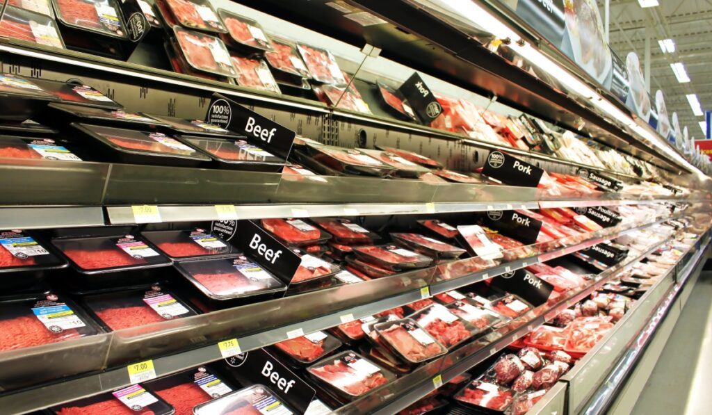 Meat and poultry products in a supermarket. Meat industry is the largest sector of the North America food manufacturing industry.