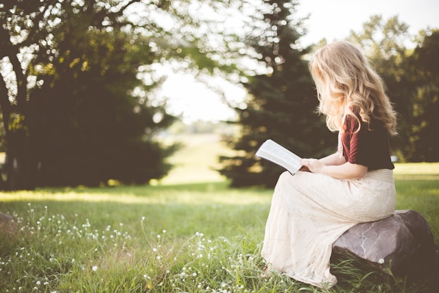 a girl reading a book