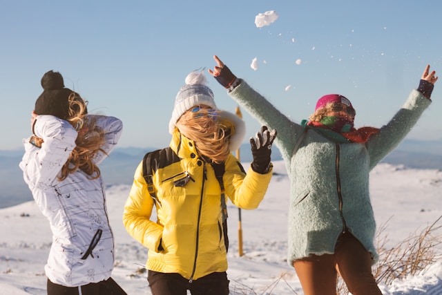 group of friends in the snow 