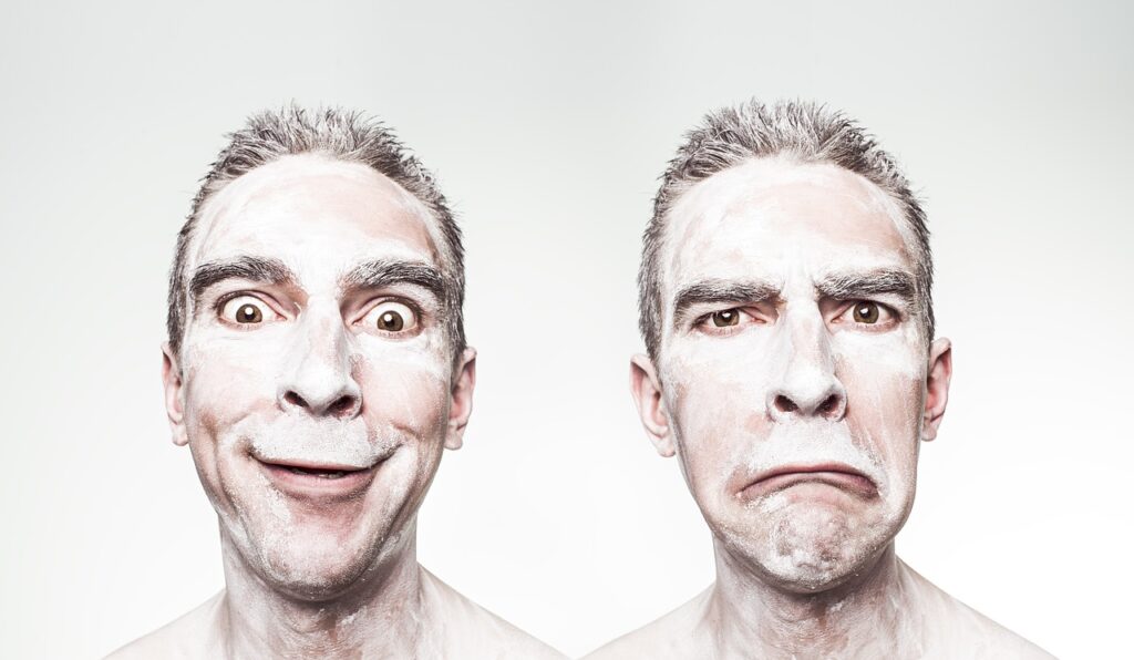 Side by side images of a man smiling and frowning. White background.