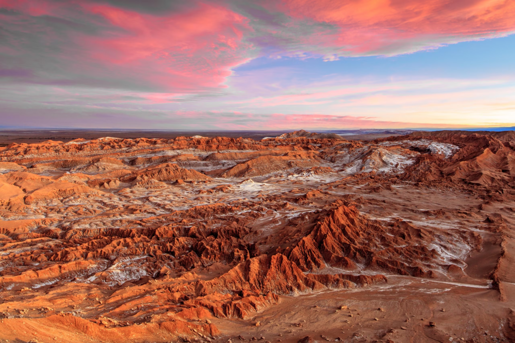 The sun shines on the rocky ridges of the Valley of the Moon in Chile's Atacama Desert.