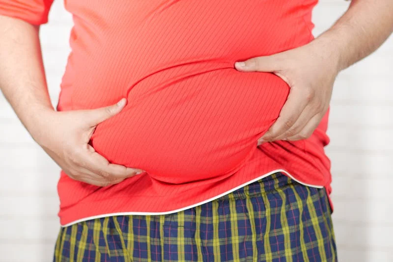 person feeling bloated