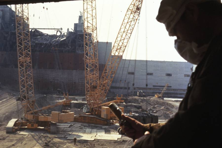 Investigators record radiation levels during the construction of a new cover or “sarcophagus” for reactor 4.