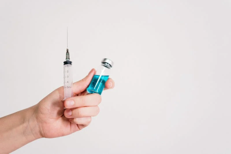 vaccine and syringe