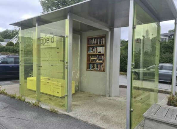books in bus stop