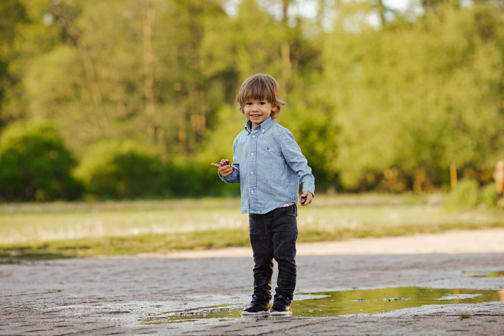 child outside enjoying themselves