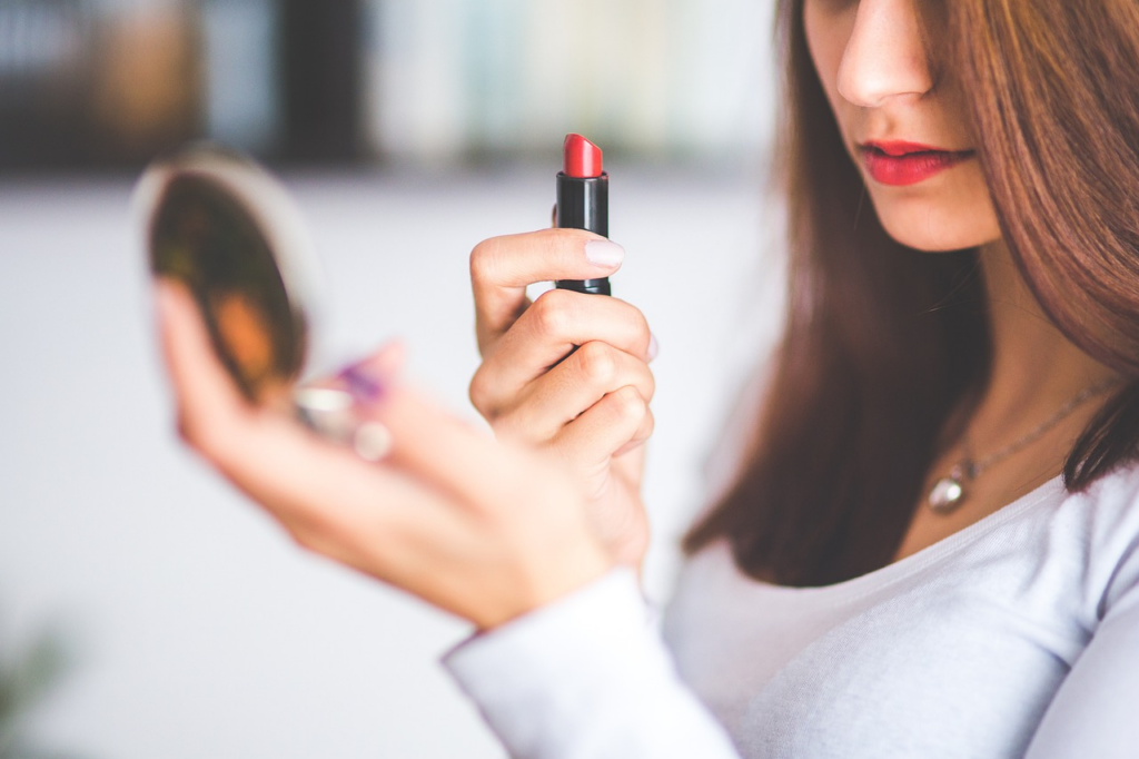 red lipstick being applied