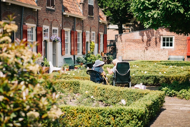 Old couple sitting in a garden