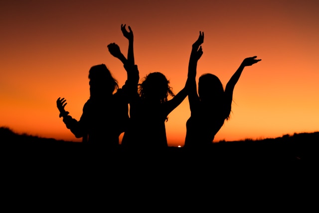 Group of girls in a sunset 