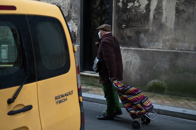 Old man with suitcase
