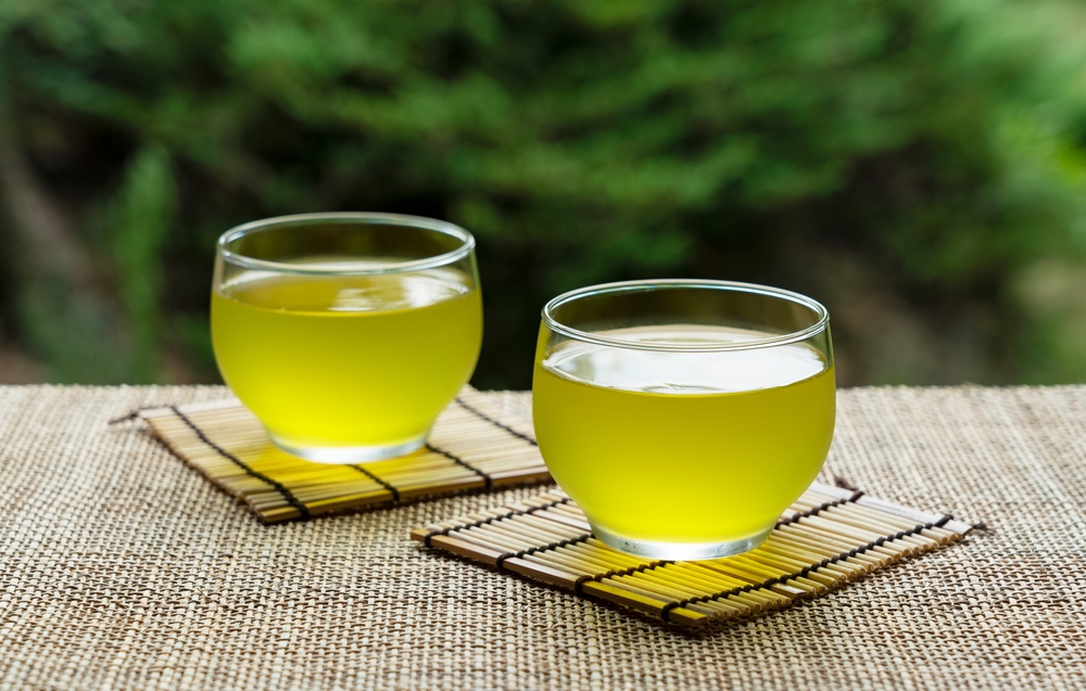 Cold Japanese green tea placed where you can see the garden. Japanese summer drink.
