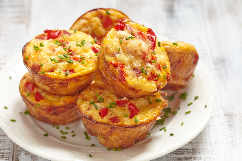 Delicious egg muffins with ham, cheese and vegetables