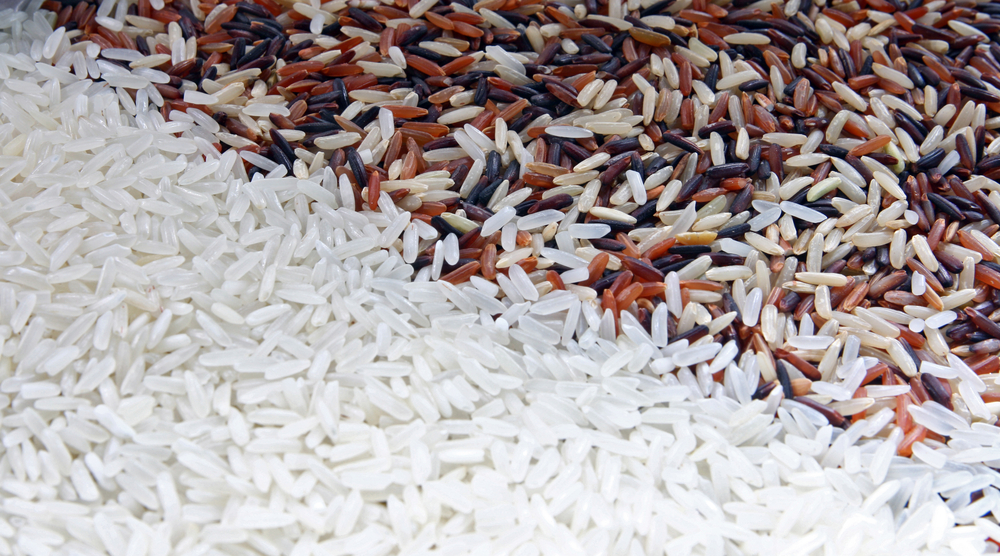 Thai Red Jasmine and Fragment magenta Organic rice up right half with White Jasmine rice, Background texture surface pattern