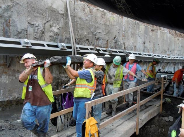 A team of archeologists with New York-based AKRF and others worked from dawn until dusk cataloging each timber and artifact before hauling the pieces off site.