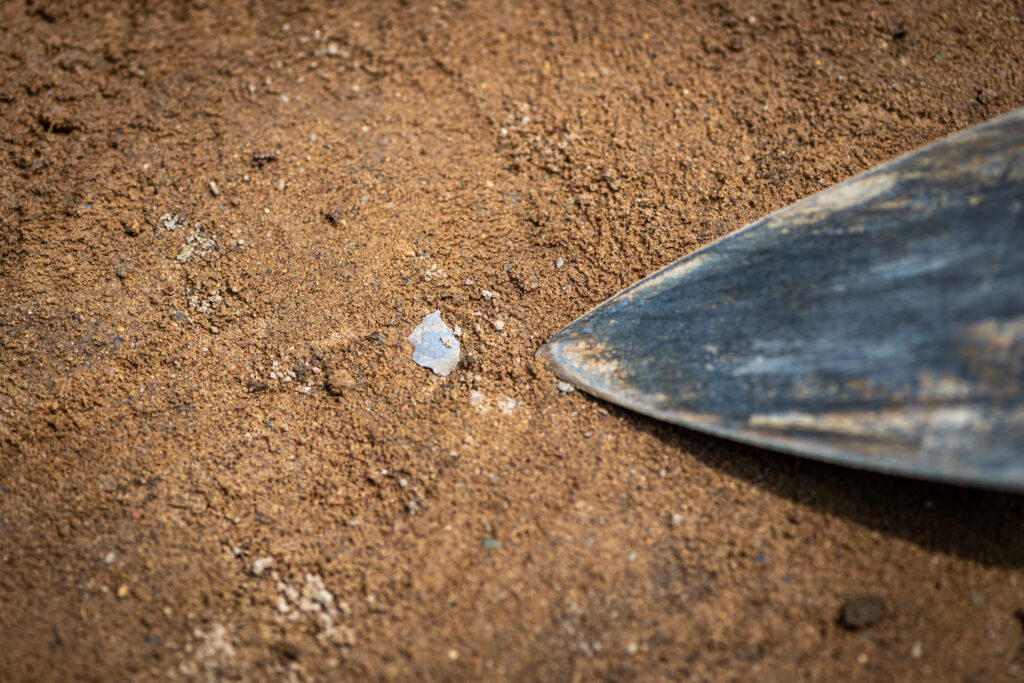 A tool fragment the size of a spade's head found at the site