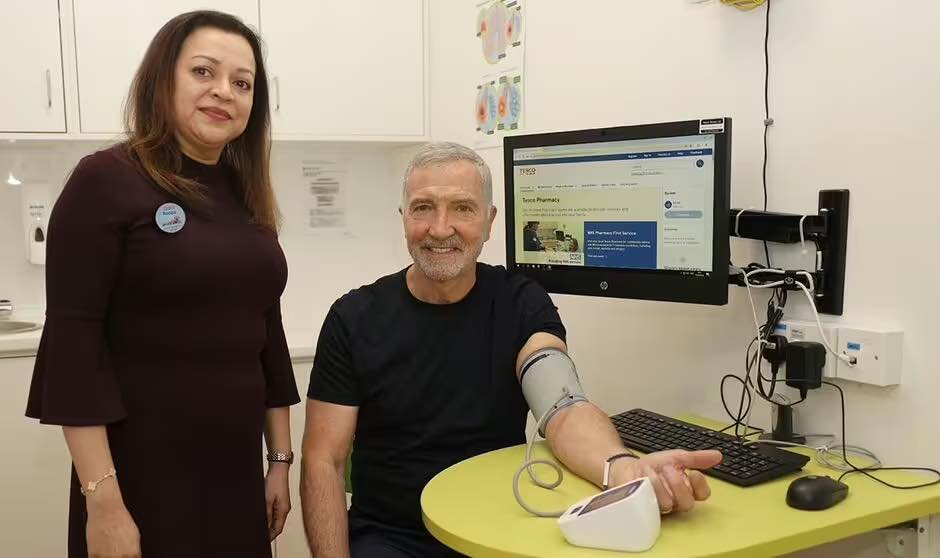 Graeme Souness getting his blood pressure checked 