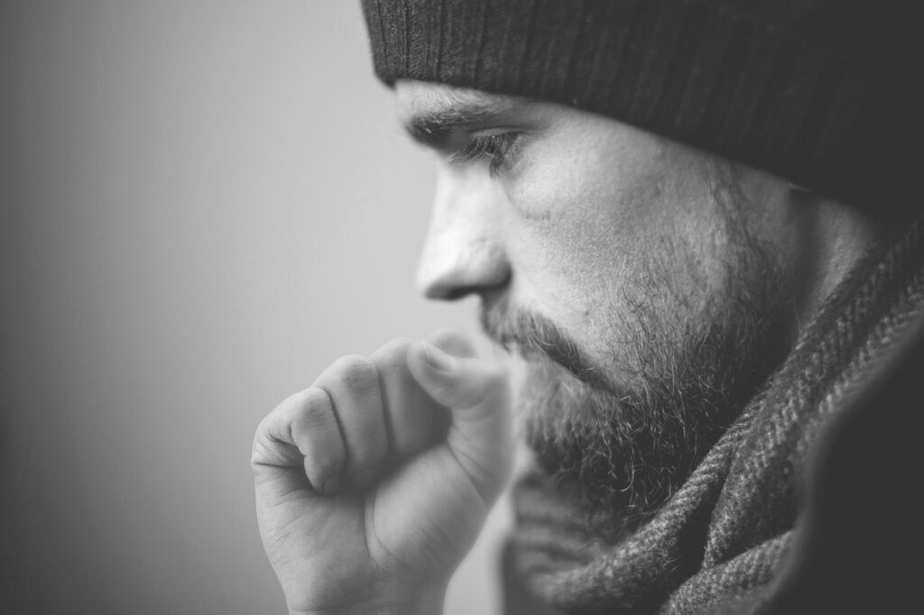 man coughing