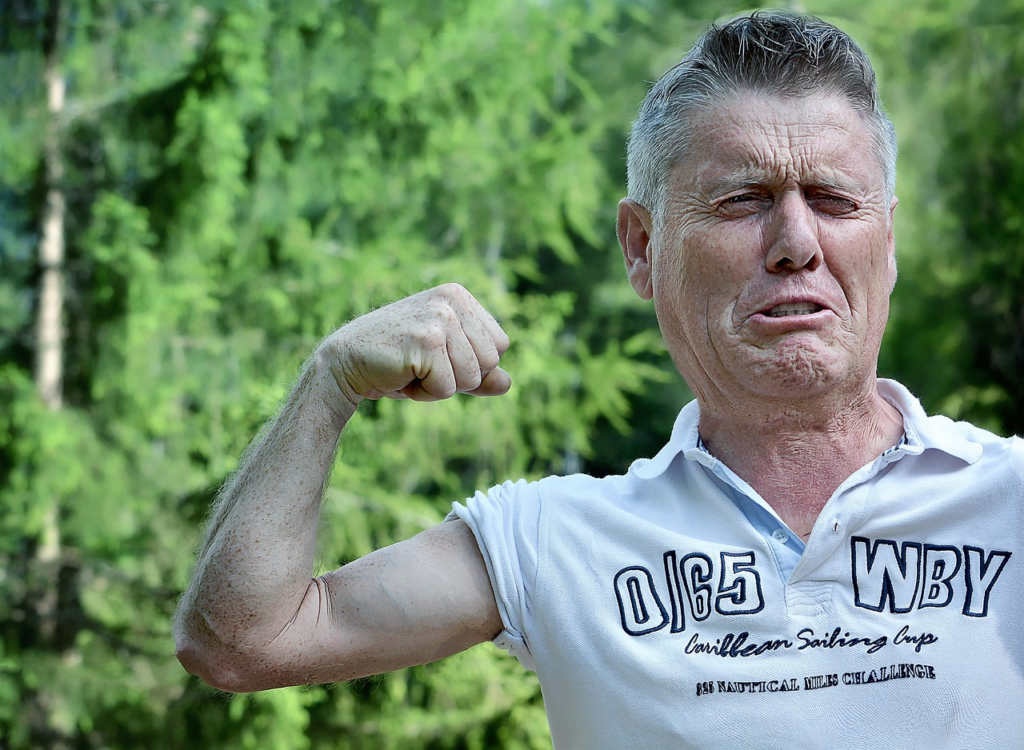 a man with an unflexed arm