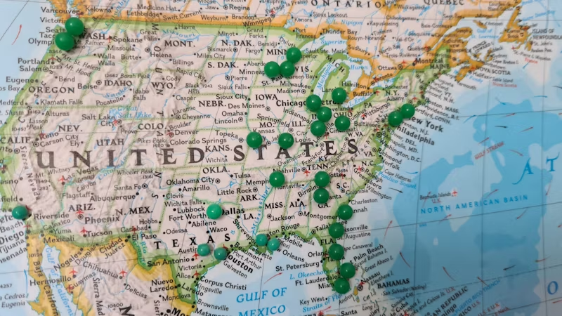 map of USA with pins in it