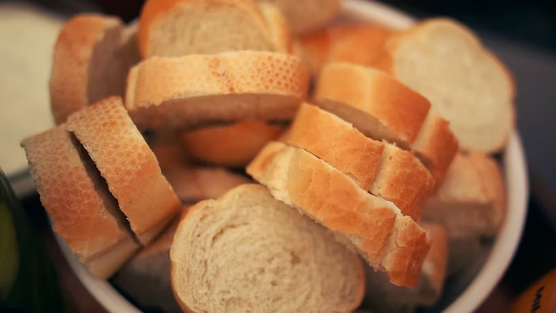 bowl full of sliced white bread 