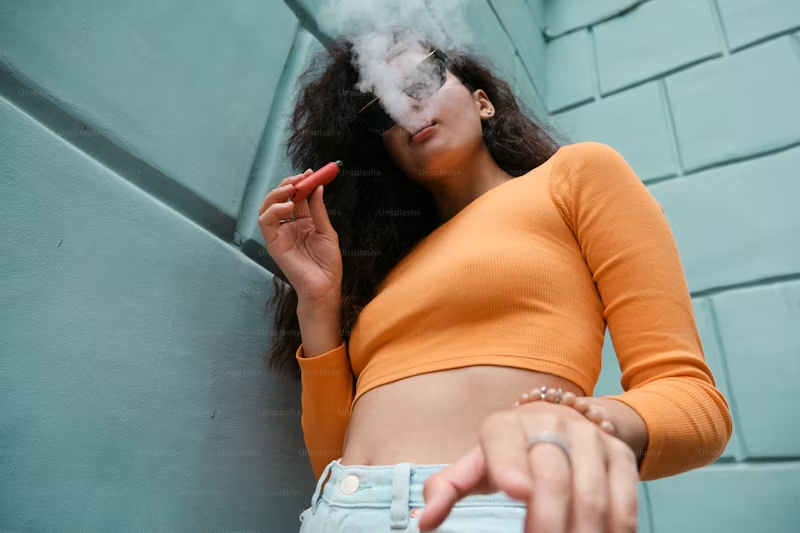 young woman vaping