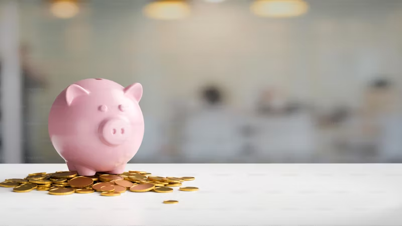piggy bank on a pile of coins