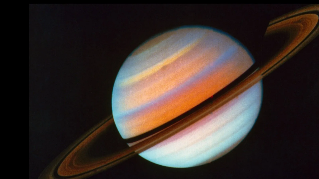 Voyager 1 color-enhanced image of Saturn taken on October 18, 1980, 25 days before closest approach