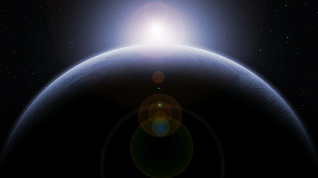 the sun just cresting Earth from space