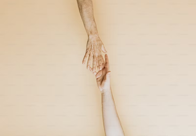 hands reaching out to each other