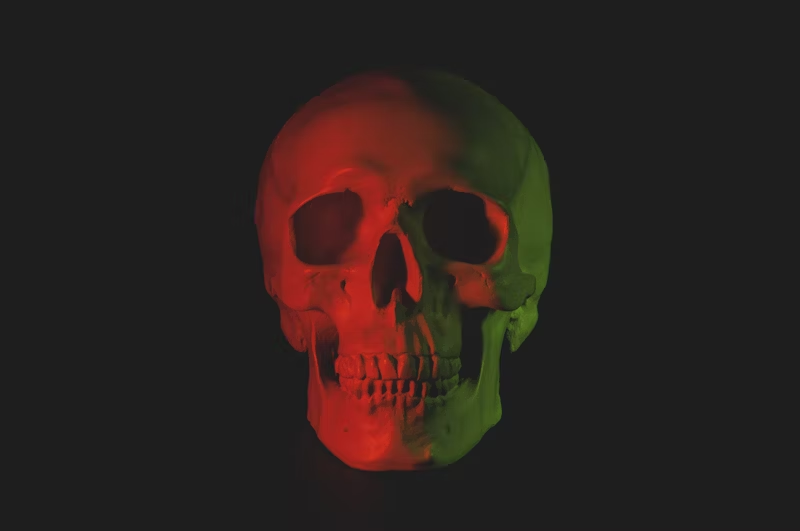 human skull lit with red light