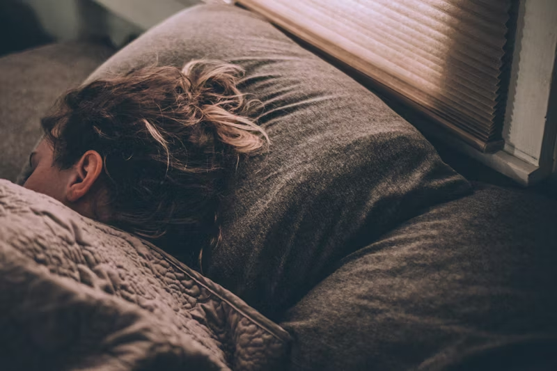 woman asleep in bed