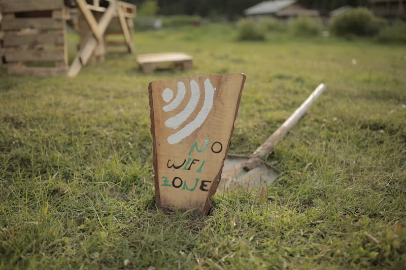 A piece of wood saying "no wifi zone"