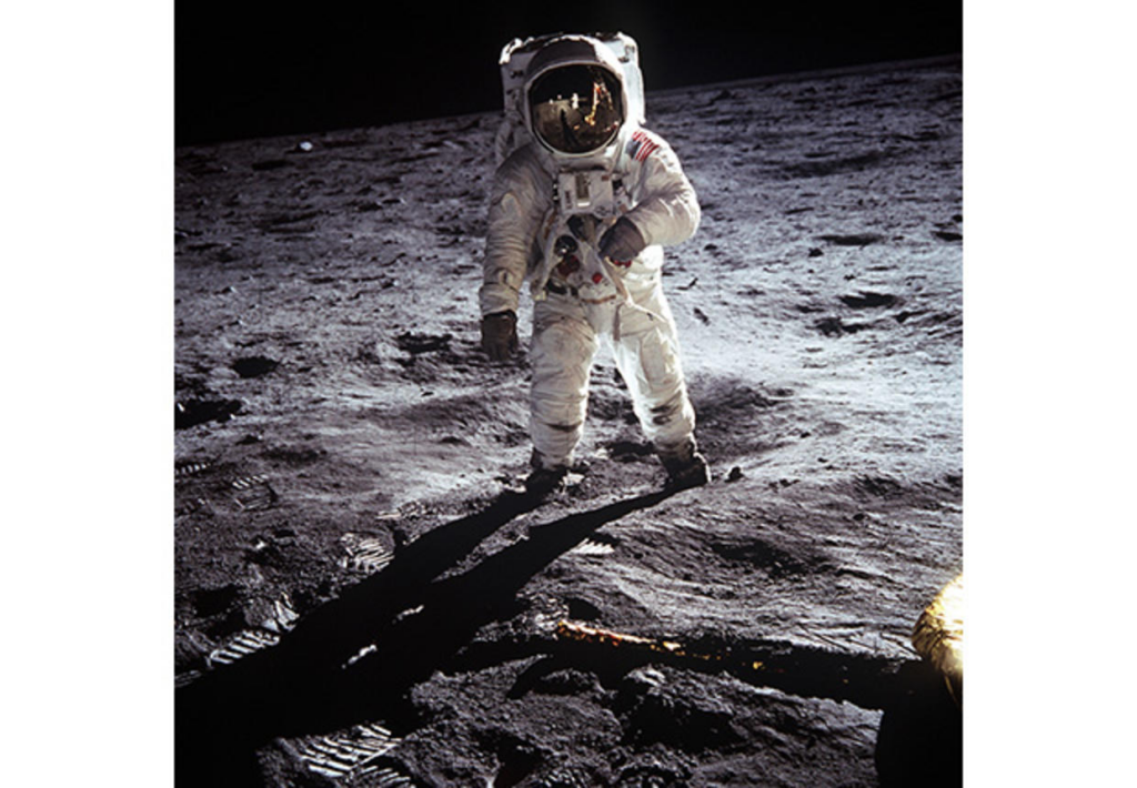 Astronaut Buzz Aldrin, lunar module pilot, walks on the surface of the Moon. Astronaut Neil A. Armstrong, commander, took this photograph with a 70mm lunar surface camera. 
