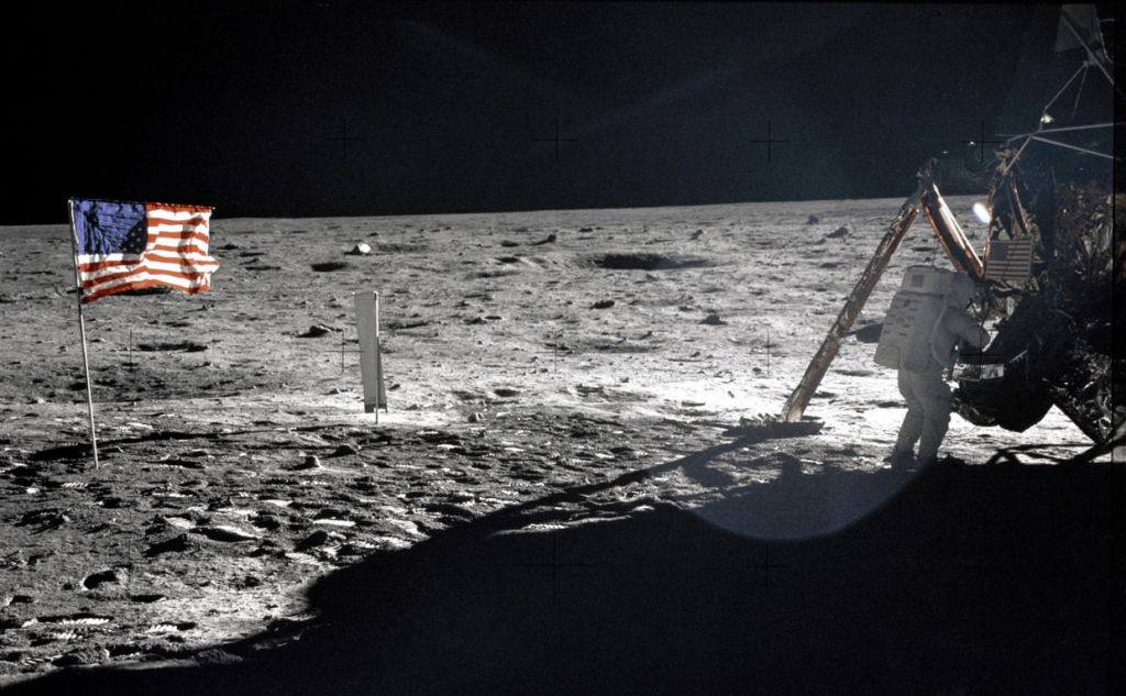 Astronaut Neil A. Armstrong, Apollo ll mission commander, at the modular equipment storage assembly of the Lunar Module "Eagle" on the historic first extravehicular activity on the lunar surface.
