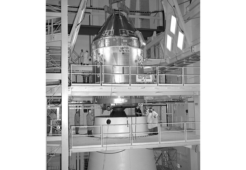 The Apollo 11 Command/Service Module (CSM) are being mated to the Saturn V Lunar Module Adapter.