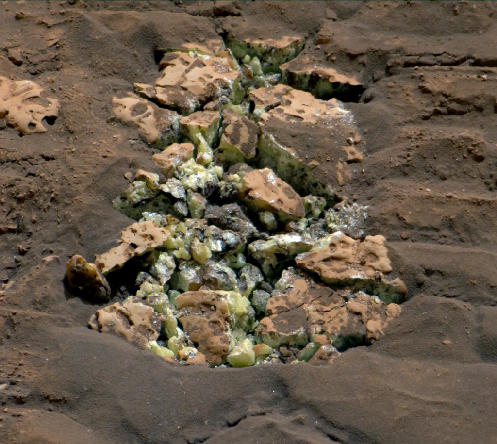 The rock was broken open when Curiosity ran over it.