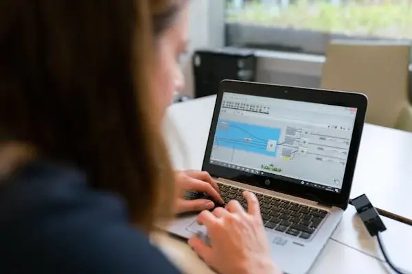 Woman working on laptop from home