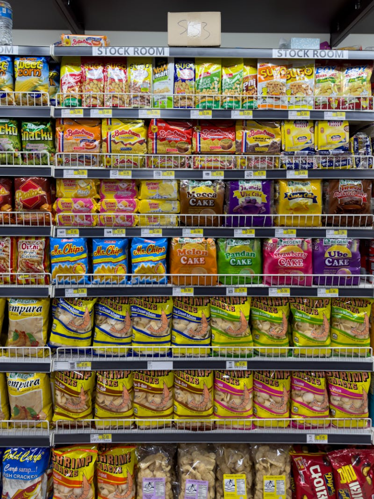 A shelf filled with snacks and other food items