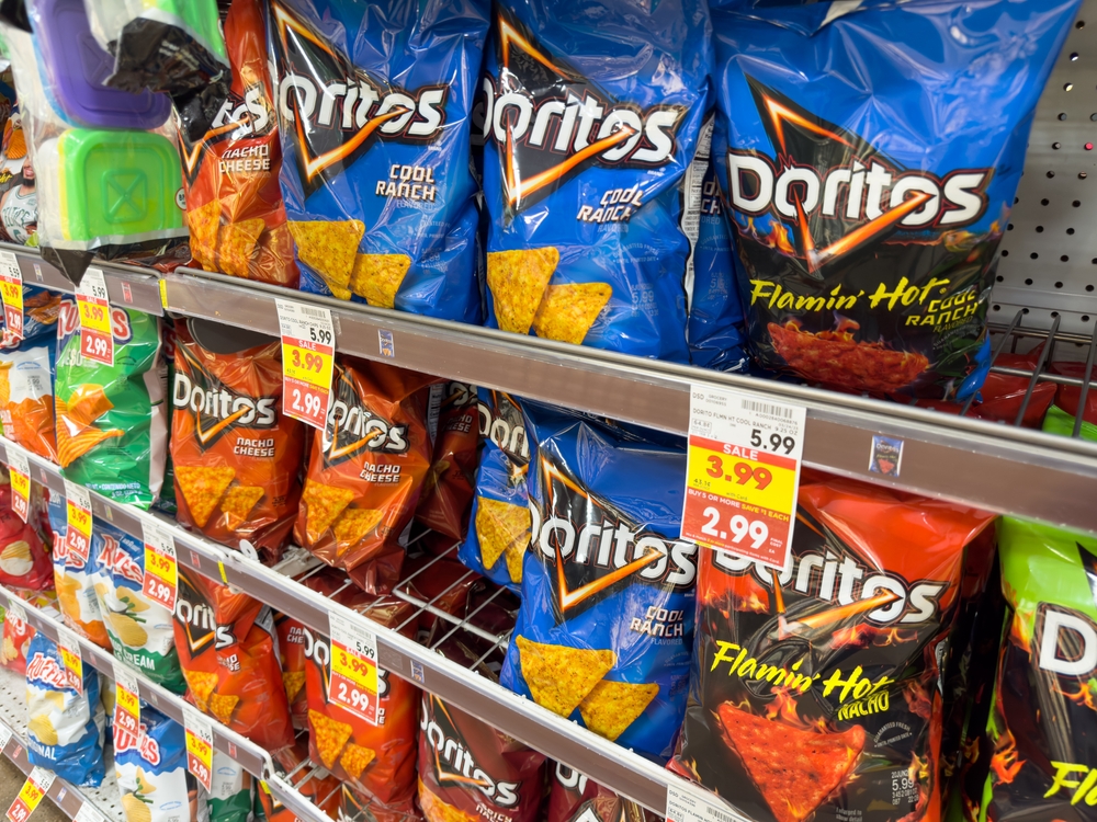Los Angeles, California, United States - 02-01-2023: A view of several shelves dedicated to varieties of Doritos chips, on display at a local grocery store.