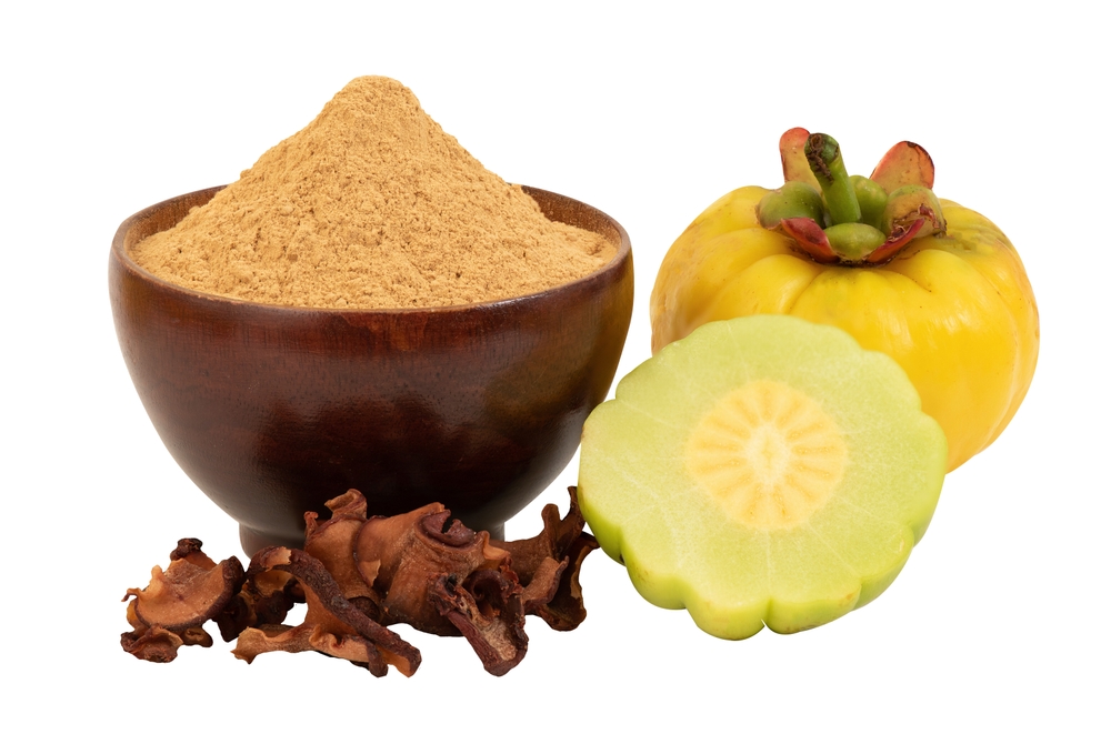 Dried ,fresh and powder garcinia fruits isolated on white with clipping path.