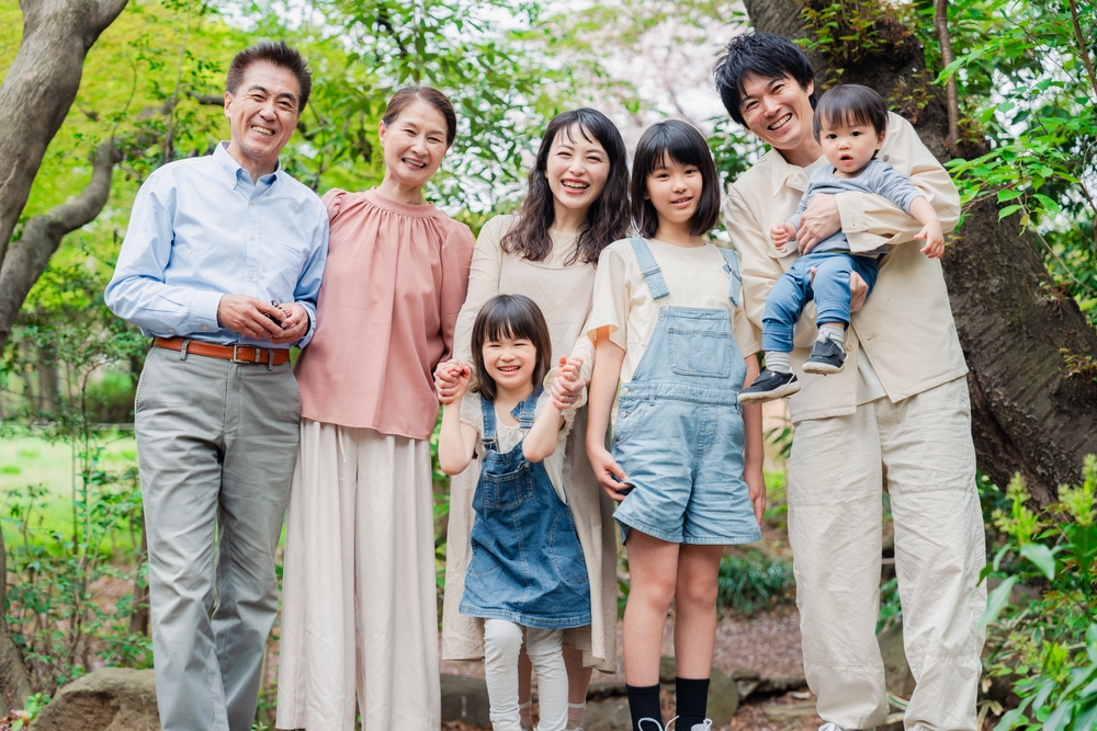 Smiling three-generation family group photo