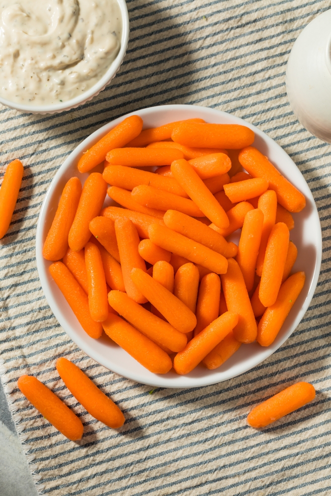 Orange Organic Raw Baby Carrots in a Bowl