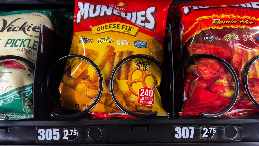 CHICAGO, IL - OCTOBER 31: Munchies snack mix chips purchased from public vending machine in airport during a travel trip at Chicago, Illinois on October 31,